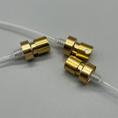 Máy bơm nước hoa màu vàng với nắp để phân phối nước hoa chính xác